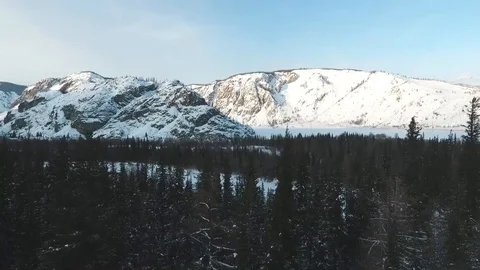 Flying over the mountains and forests of Altai. Siberia. Winter. Stock-Footage 109601867