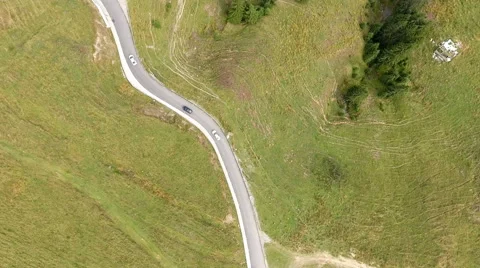 Flying over the mountains and road Stock Footage 66418839