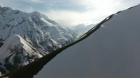 Flying over mountains covered with snow in Tajikistan Pamir 库存影片 63245227