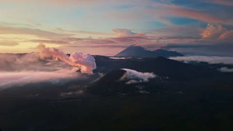 Flying over mountains during sunset Stock Footage 297318875