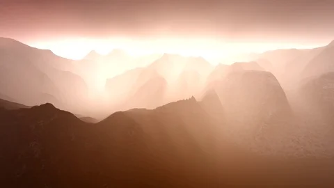 Flying over mountains in the fog Stock Footage 77914799