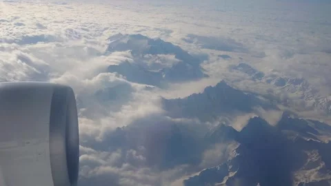 Flying over mountains from passenger point of view for travel concept 스톡 동영상 279845543