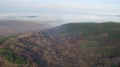 Flying over the mountains turning into cloudy infinity top view Aerial Stock Footage 58254192