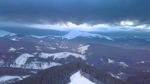 Flying over the mountains in winter Stock Footage 129598307
