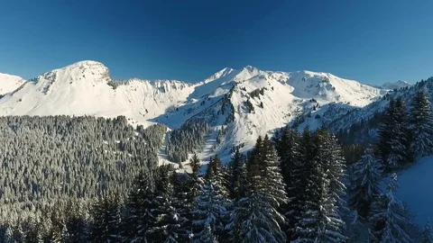 Flying Over the Mountains in the Winter Season Stock Footage