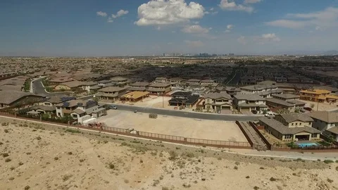 Flying over a neighborhood under construction on the edge of Las Vegas, NV Stock Footage 88568077