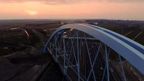 Flying over new build bridge at rush hour 4K Stock Footage 87719051