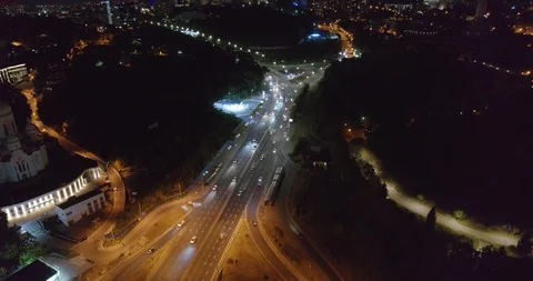Flying over Night Crossroads Cityscape Lights 4K Stock Footage 116372089