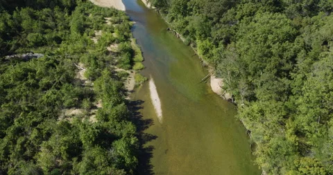 Flying Over The North Fork River Flowing Through The Dense Forest In Devils Stock Footage 326311953