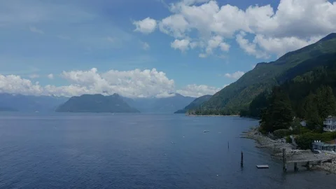 Flying over the ocean along the pacific coastline in British Columbia Stock Footage 111940286
