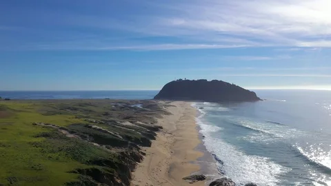 Flying Over the Ocean Facing the Point Sur Lighthouse Video stock 112839779