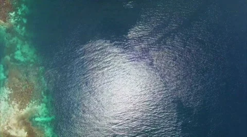Flying over the ocean at the shore Stock Footage 64139539
