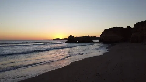 Flying over the ocean at sunset Stock Footage 125272133