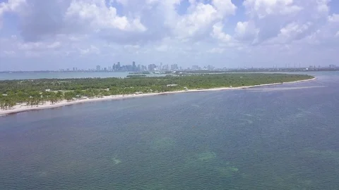Flying over Ocean towards Crandon Beach - Key Biscayne FL - 4K Stock Footage
