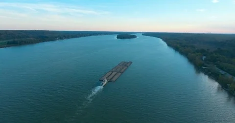 Flying over the Ohio River with a  Barge Headed to Louisville Stock Footage 70846849