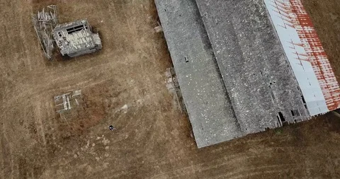 Flying over old barn roof Stock Footage
