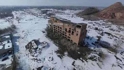 Flying over the old destroyed building in winter. Stock Footage 105069879