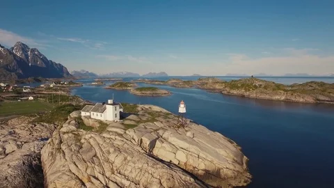 Flying Over Old Lighthouse In  Norwegian Fishing Village Of Henningsvaer Vídeo Stock 78001987