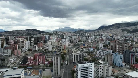 Flying over one of the busiest roads in downtown Quito, Ecuador Stock Footage 202805629