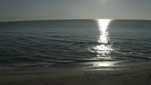 Flying over the open ocean at sunset. Stock Footage 241313346