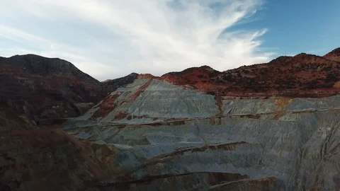 Flying over open pit copper mine in Bisbee, AZ Stock Footage 101814091