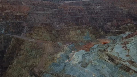 Flying over open pit copper mine in Bisbee, AZ Stock Footage 101814255