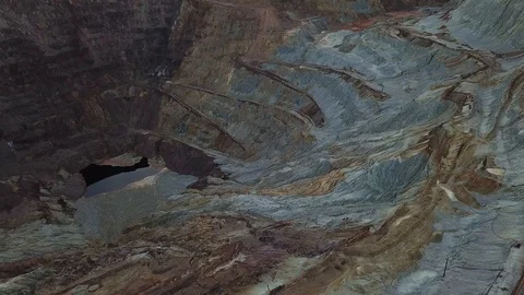 Flying over open pit copper mine in Bisbee, AZ Stock Footage 101814334