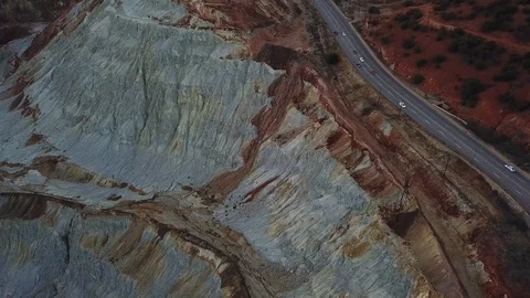 Flying over open pit copper mine in Bisbee, AZ Stock Footage 101814439