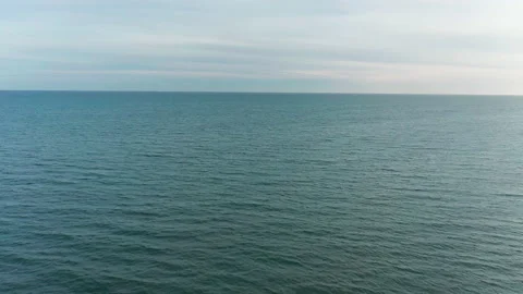 Flying over open water away from horizon, aerial view over the ocean sea Stock Footage 152260750