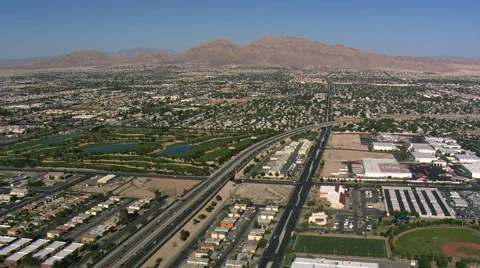 Flying over outlying Las Vegas above I-15 and Las Vegas Boulevard. Shot in 2008. Stock Footage 59544551