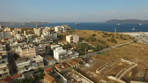 Flying over outskirts of small town in southern Europe at sunset. Stock Footage 87073675