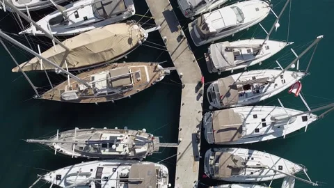 Flying over parked yachts Stock Footage 208109102