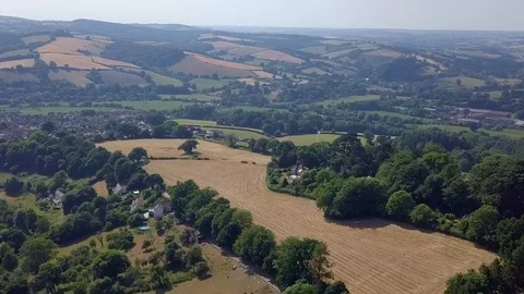 Flying over a patchwork rural landscape in Devon, England Video stock 93520890