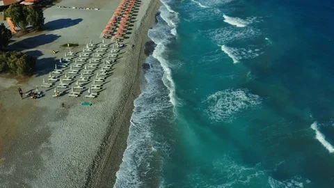 Flying over a pebble beach with waves and surf, Rhodes island, Greece, views of 스톡 동영상 118290286