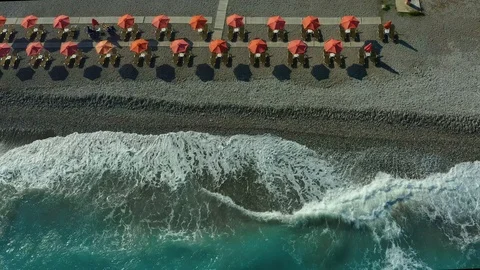 Flying over a pebble beach with waves and surf, Rhodes island, Greece, views of Stock-Footage 118291029