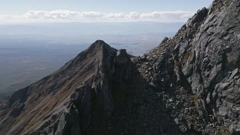 Flying over the picturesque bare rocks of the Eastern Sayan mountains Stock Footage 278303345