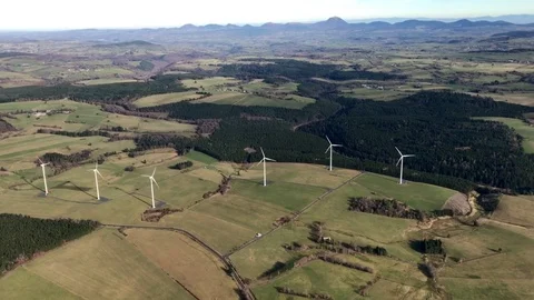 Flying over plains with windmills Видео 74061845