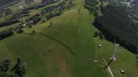 Flying over Polom Mountain next to wind turbine. Beskid Sadecki Mountains. Stock Footage 140070953