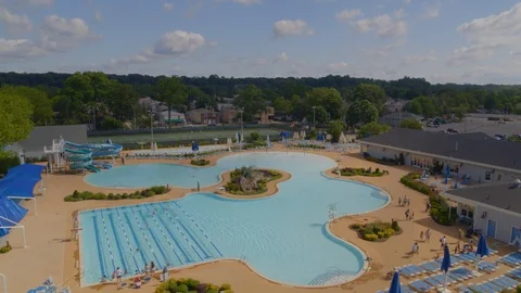 Flying Over a Pool Complex in Port Washington Long Island Stock Footage 113015676