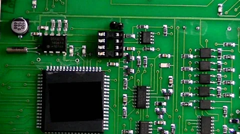  	Flying over the printed circuit board with chips and capacitors and resistors 스톡 동영상 58850234
