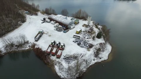 Flying over a quarry covered with snow in Northern Germany. Stock Footage 86530204