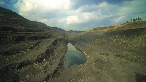 Flying over the quarry for the extraction of coal Stock Footage 145291042