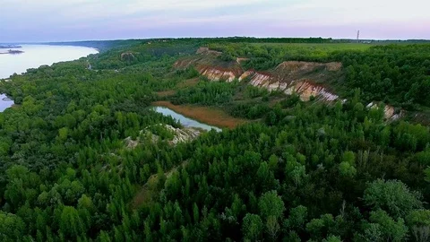 Flying over the quarry lake 스톡 동영상 85396473