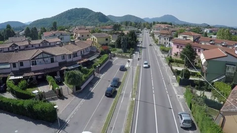 Flying over a quiet street, light traffic, Italy Stock-Footage 72265700