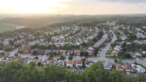 Flying over a quiet subdivision, at Sunset - Barrie, Ontario Video stock 315420555