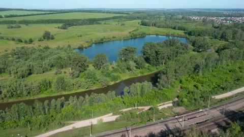 Flying over Railway river forest and lake. Vidéo 110081377