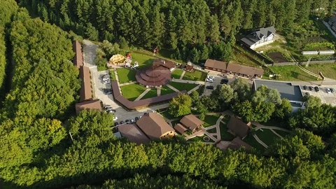 Flying over a Recreation Center in the Forest. Cottage Settlement. Naberezhnye C Stock Footage 127790877