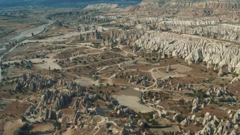 Flying over of Red and Rose Valley, Goreme of Nevsehir in Cappadocia, Turkey 4K Stock Footage 220433073