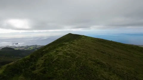 Flying over ridge peak Low Flight Over An Amazing Mountain Range Island Azores Stock Footage 221503702
