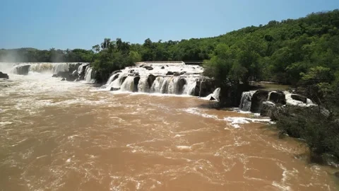 Flying over a river amid waterfalls and beautiful nature.Salto Saudades. Stock Footage 233219694